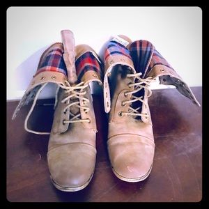 Lace up boots!! Very little wear and tear :)